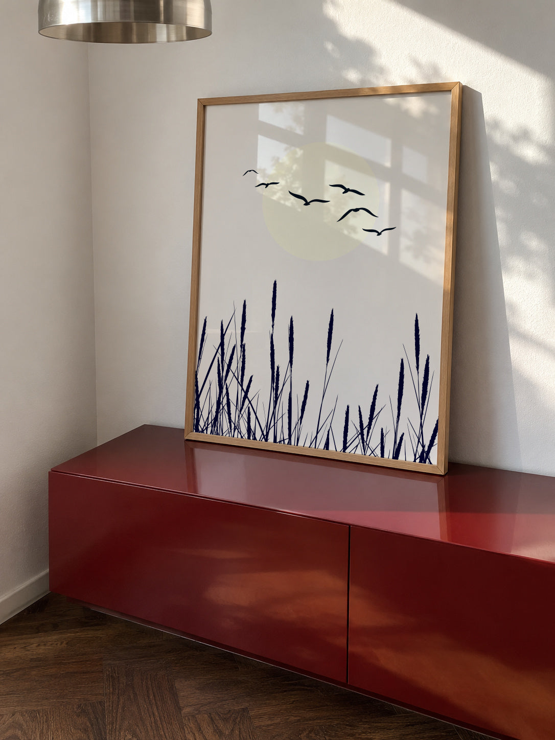 Sunrise - Framed poster in an interior