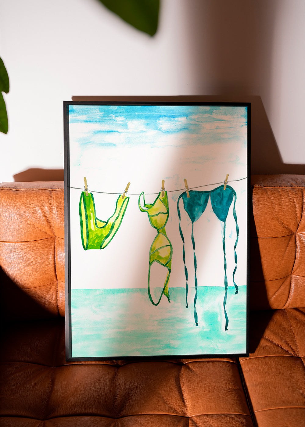 Illustrazione di costumi appesi in spiaggia