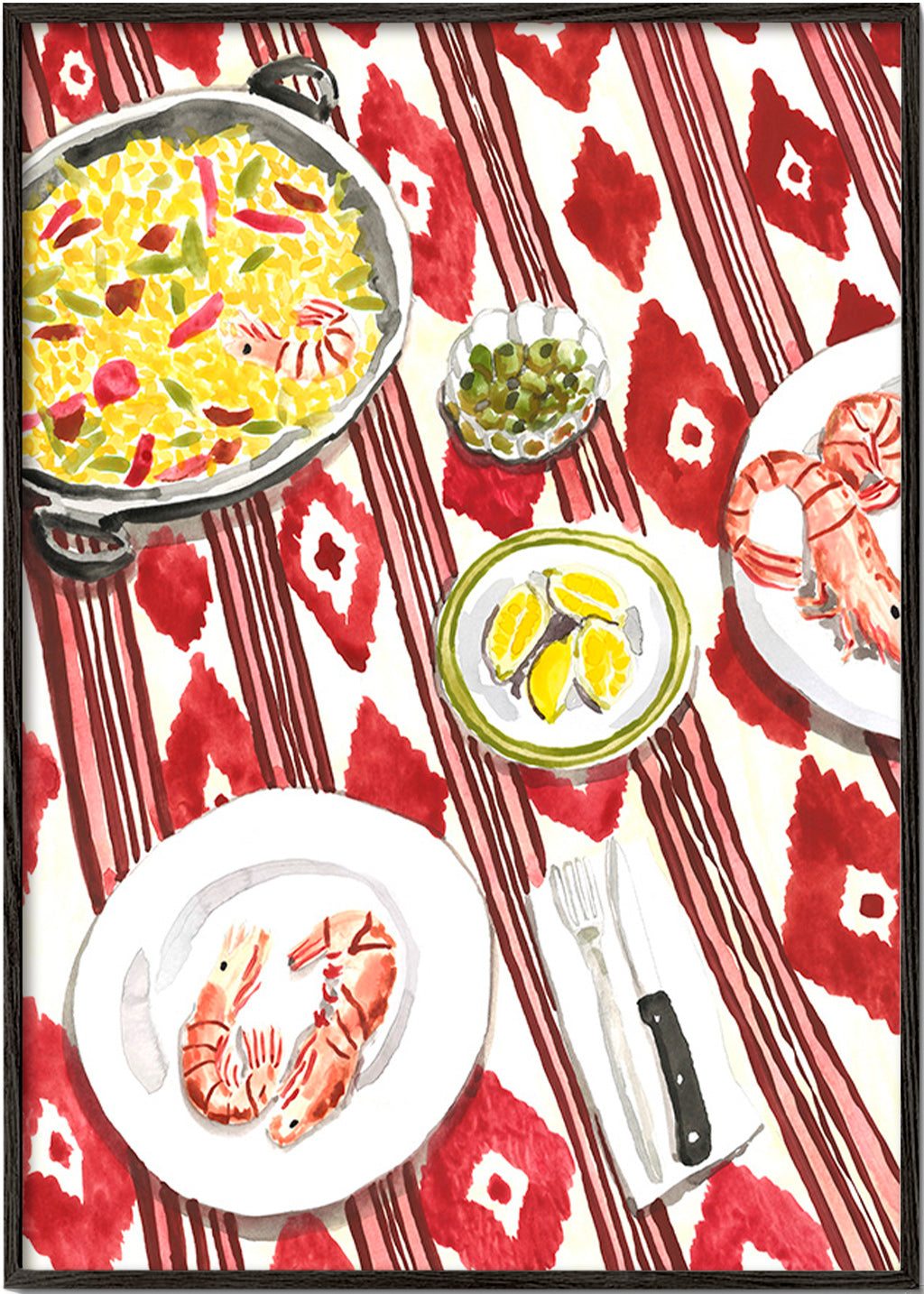 Arte da cucina: paella e gamberi su tovaglia a fantasia