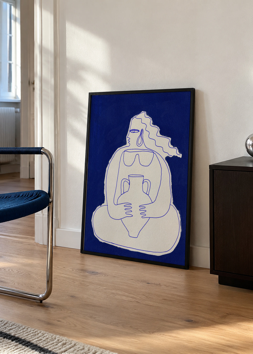 Solitude 2 - Framed poster in an interior