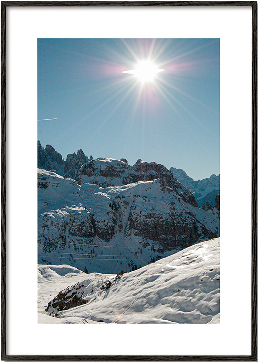 Arte paesaggistica: cime innevate sotto il sole