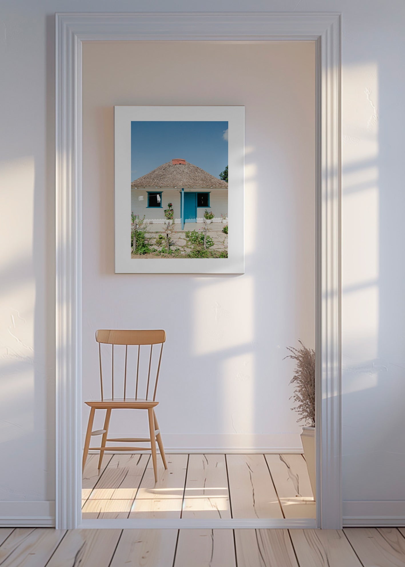 Quadro paesaggistico con casetta e porta blu