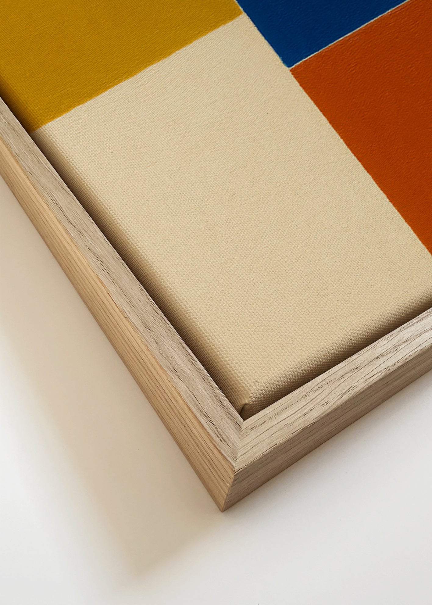 Cuadro abstracto de bloques mostaza y azul – Canvas detail