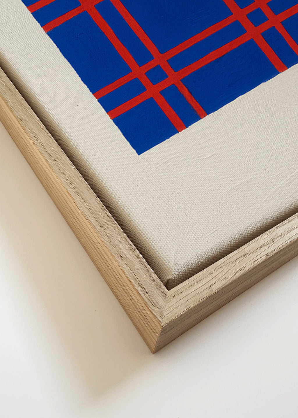 Cuadro geométrico azul con trama roja – Canvas detail