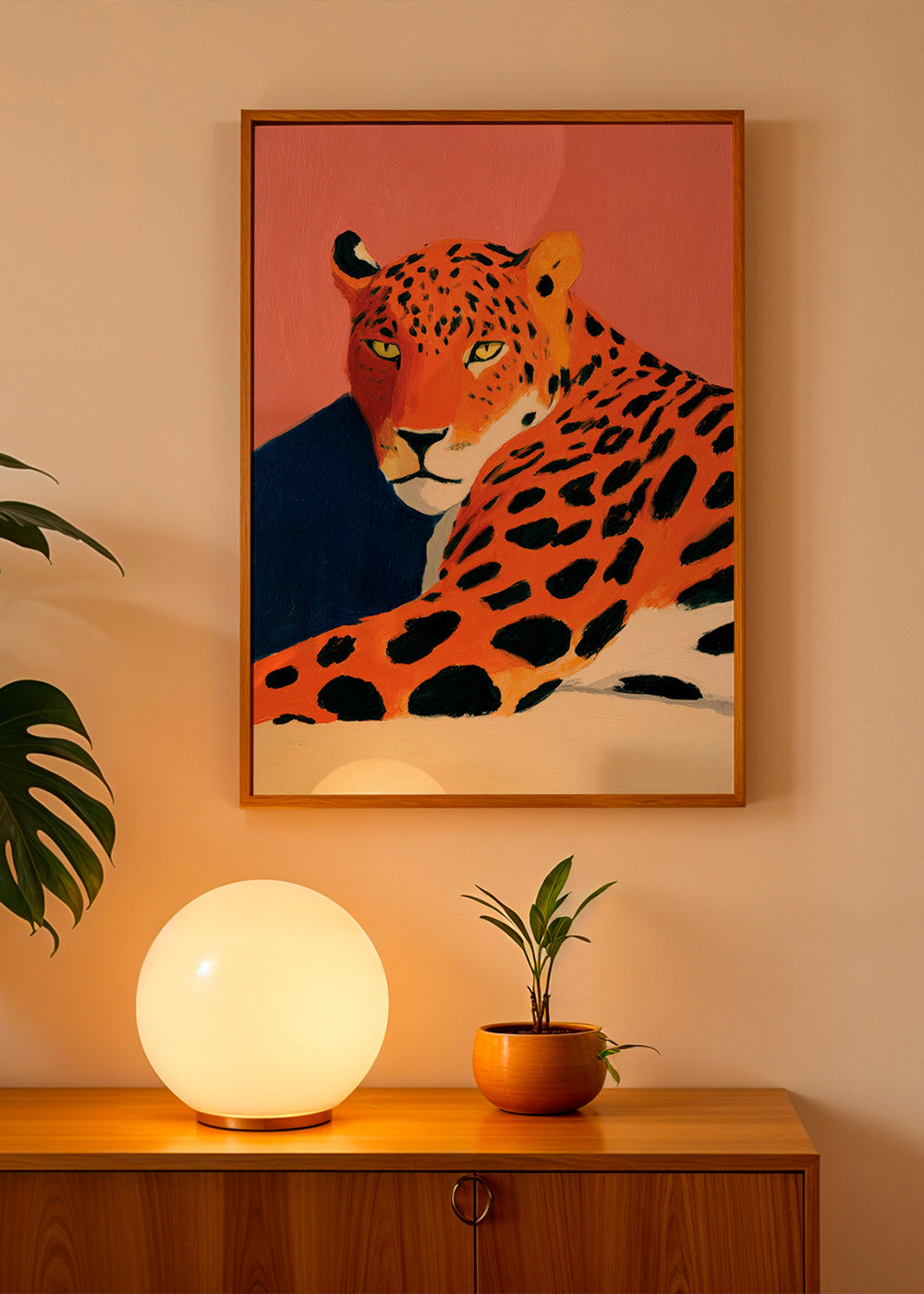 Quadro: Leopardo riposante su sfondo rosa