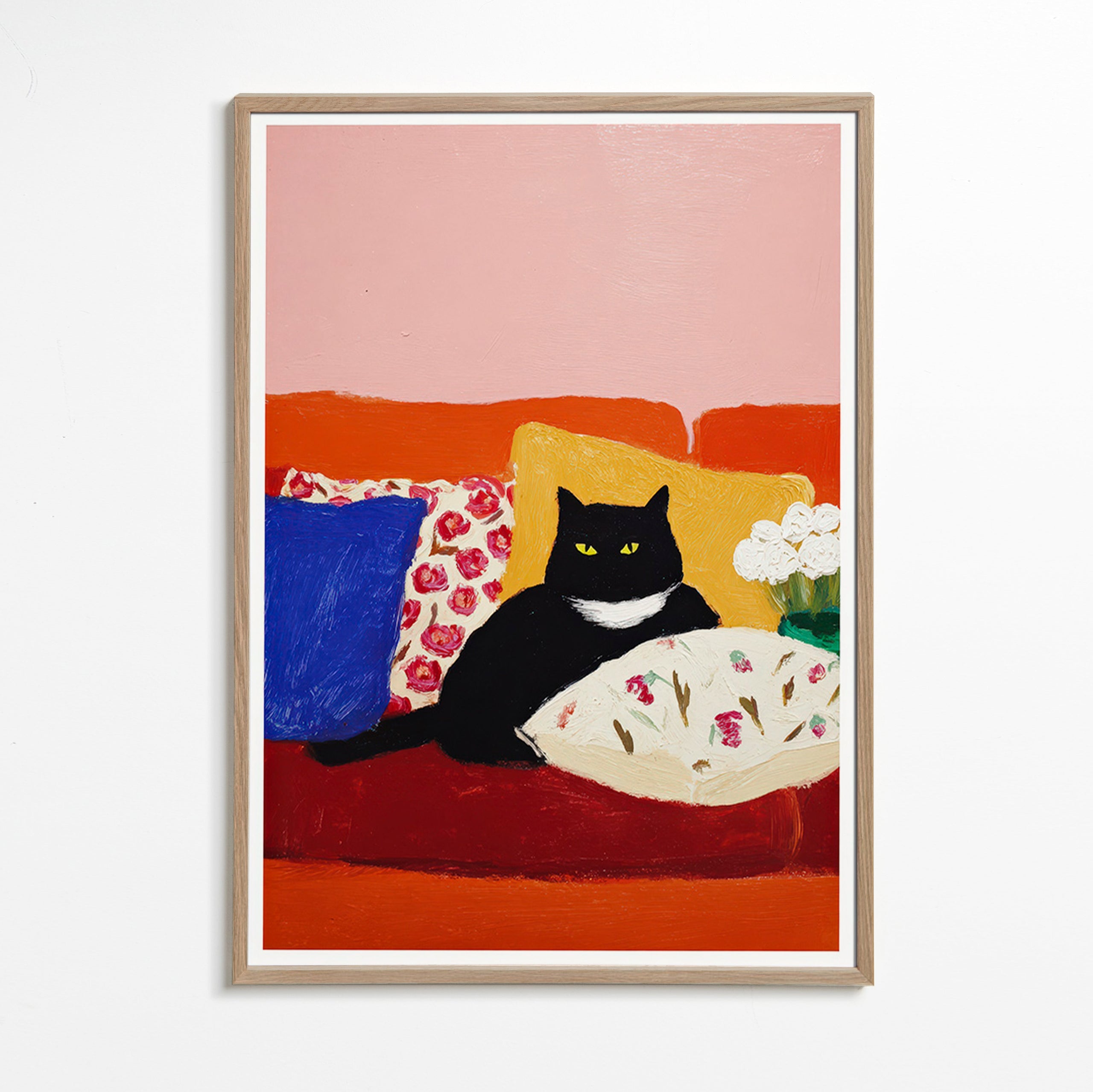 Opera gatto nero su divano colorato
