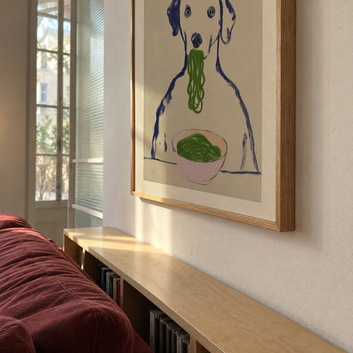 Dinner for Dogs - Framed poster in an interior