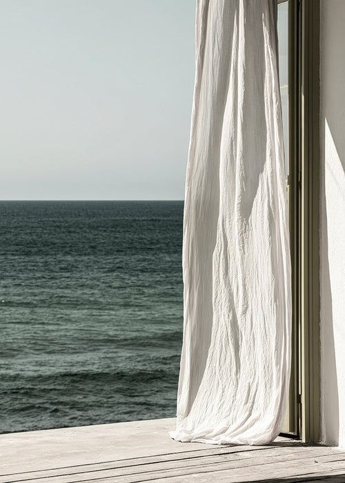 Quadro di paesaggio con tenda sul mare