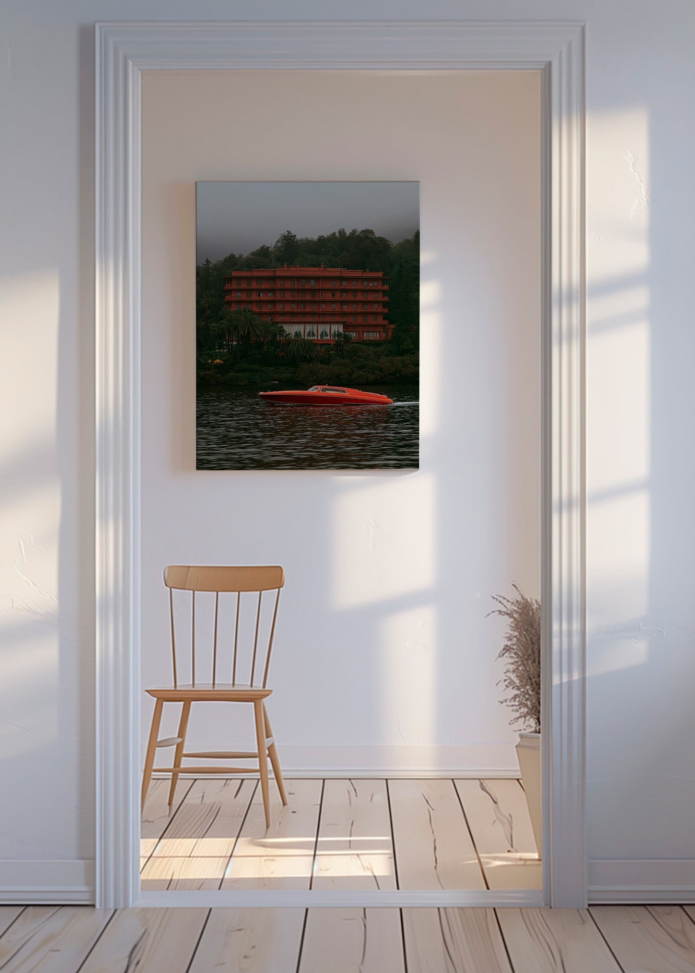 Quadro paesaggio con hotel rosso e motoscafo