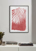 Palm leaves on red paint