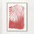 Palm leaves on red paint