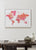 Detailed hot pink watercolor world map with labels in Spanish, Tatiana