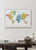 Detailed rainbow watercolor world map with labels in Spanish, Jule